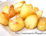 Patate al forno dorate e croccanti, un contorno perfetto per ogni pasto.