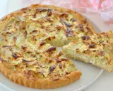 Torta salata con carciofi, una delizia dai Menù di Benedetta, con crosta dorata e ripieno cremoso.